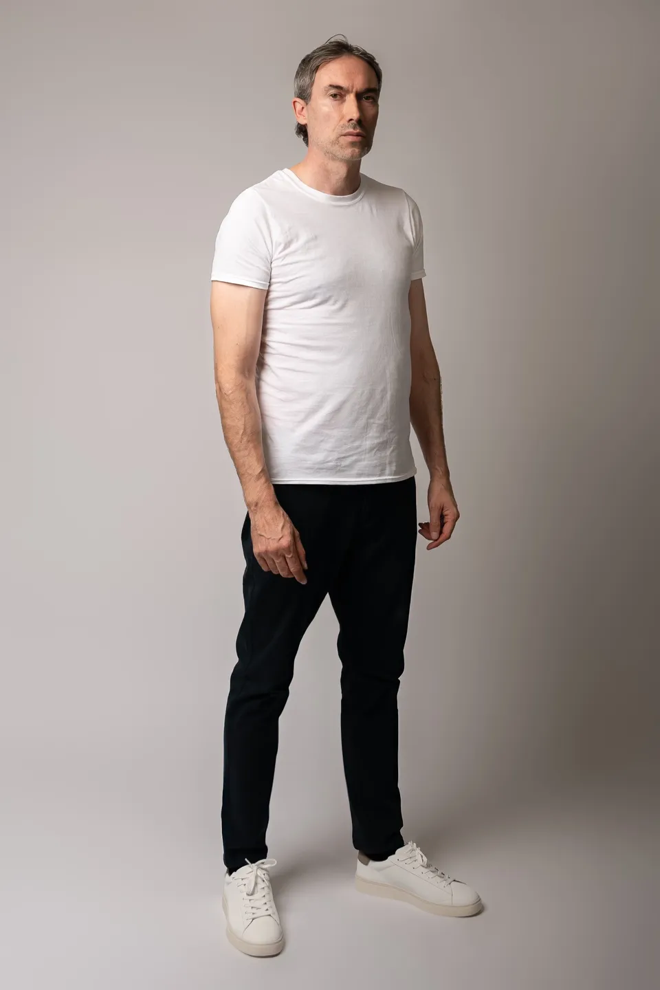 Kieron C, full length, white tee and black trousers