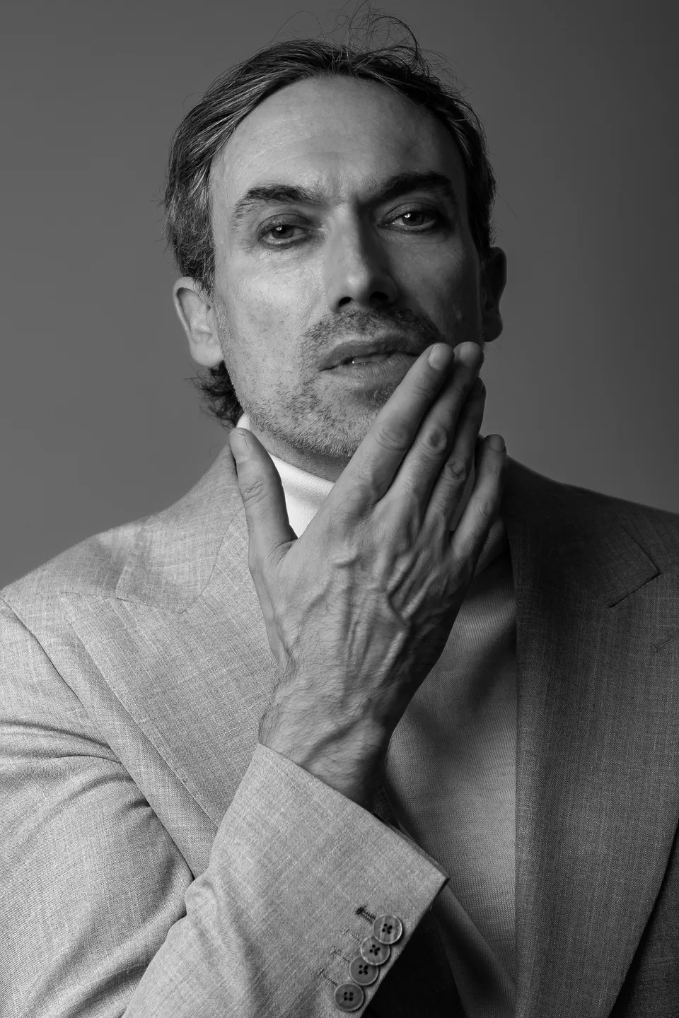 Kieron C, black and white, hand on chin